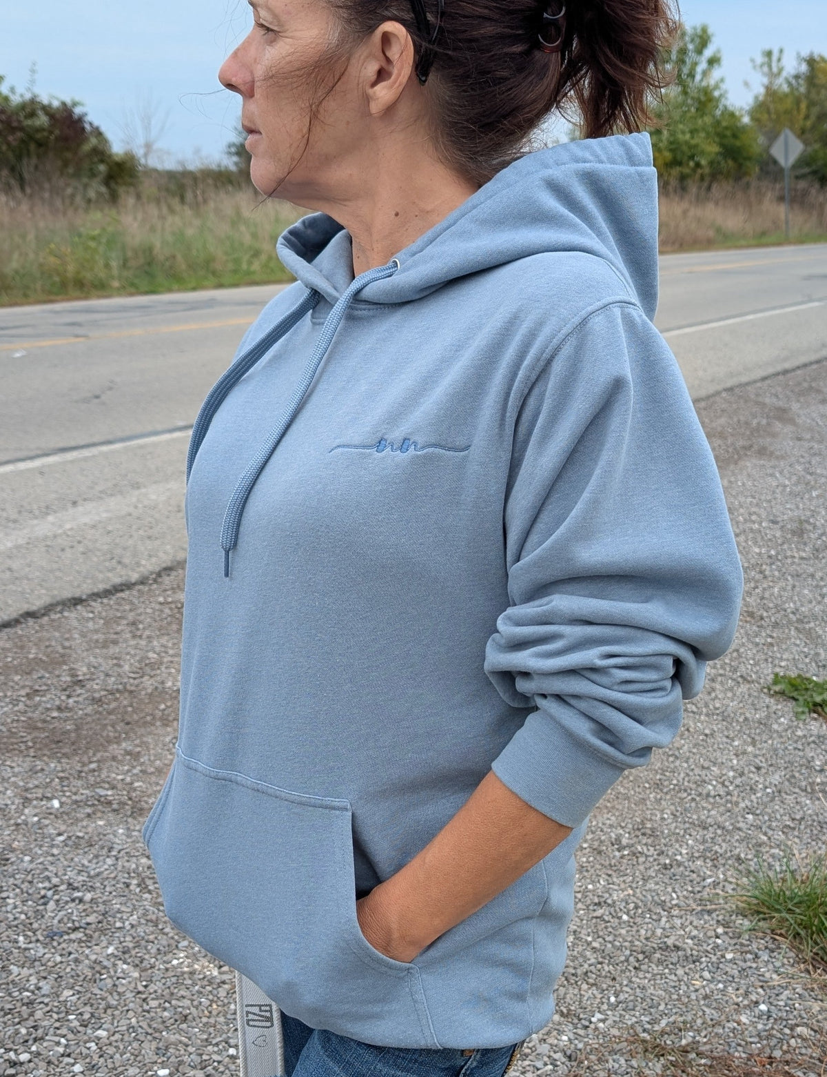 The Coastal Hoodie in Skystone — side view showing fit and pouch pocket