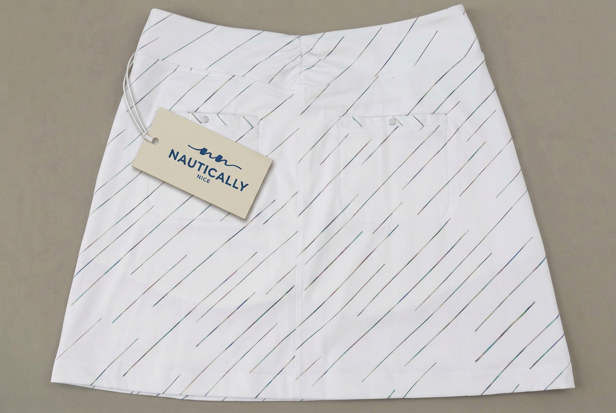 White skort with the same beige Nautically Nice tag design and white cord as the black skort
